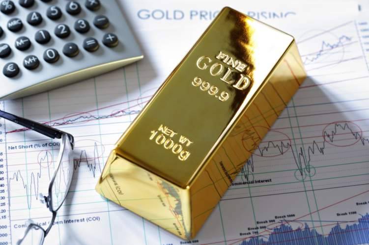 الذهب يرتفع مع تراجع الدولار والأسهم