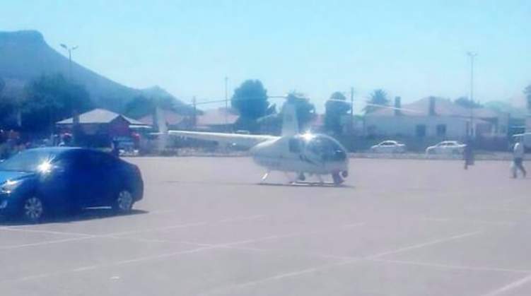 ضابط يهبط بطائرة هليكوبتر لشراء وجبة طعام من كنتاكي (صور)