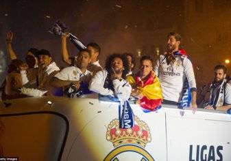 بالصور- هكذا احتفل لاعبو وجماهير ريال مدريد بلقب الدوري