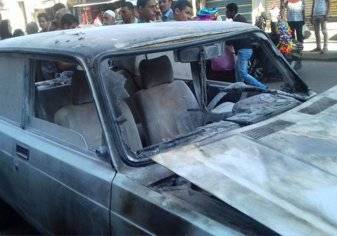 احتجاجاً على تحرير مخالفة ضده. . سائق مصري يشعل النيران في سيارته (صور)