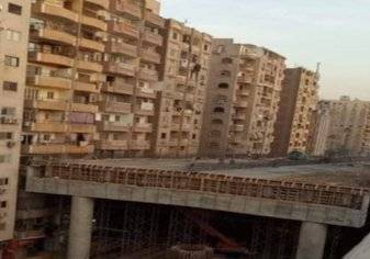 ما حكاية الجسر الملاصق للبنايات السكنية في مصر؟