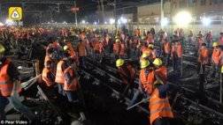 عمال يبنون مسار سكك حديدية في الصين  في 9 ساعات