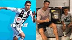 Cristiano-Ronaldo-and-son-pose-with-worlds-first-copy-of-FIFA-19-lailasnews-3.jpg