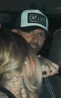 5026996-6273403-Aguero_was_joined_by_a_tattooed_blonde_woman_as_he_enjoyed_some_-m-14_1539470413952.jpg