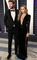 10240526-6741777-Newlywed_glow_Miley_and_husband_Liam_Hemsworth_posed_for_some_co-a-72_1551080263693 copy.jpg